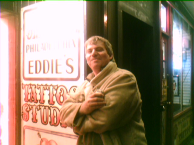 Bob poses in front of Fast Eddies